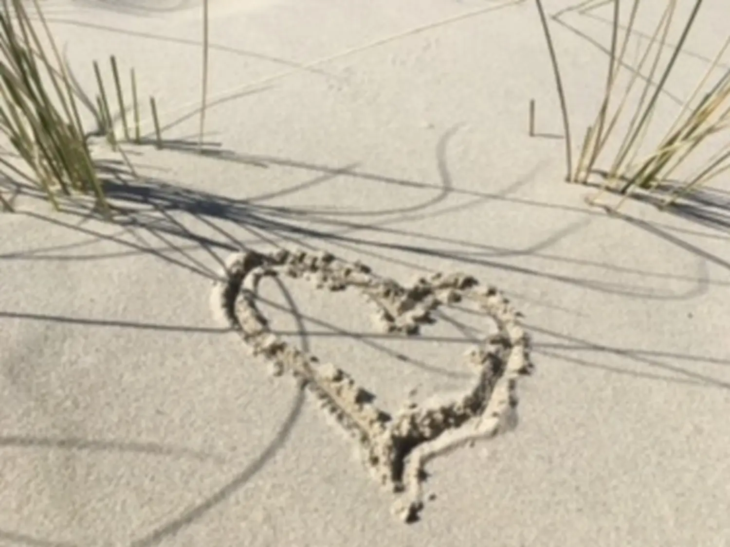 Herz auf Sand bei Pension Janssen